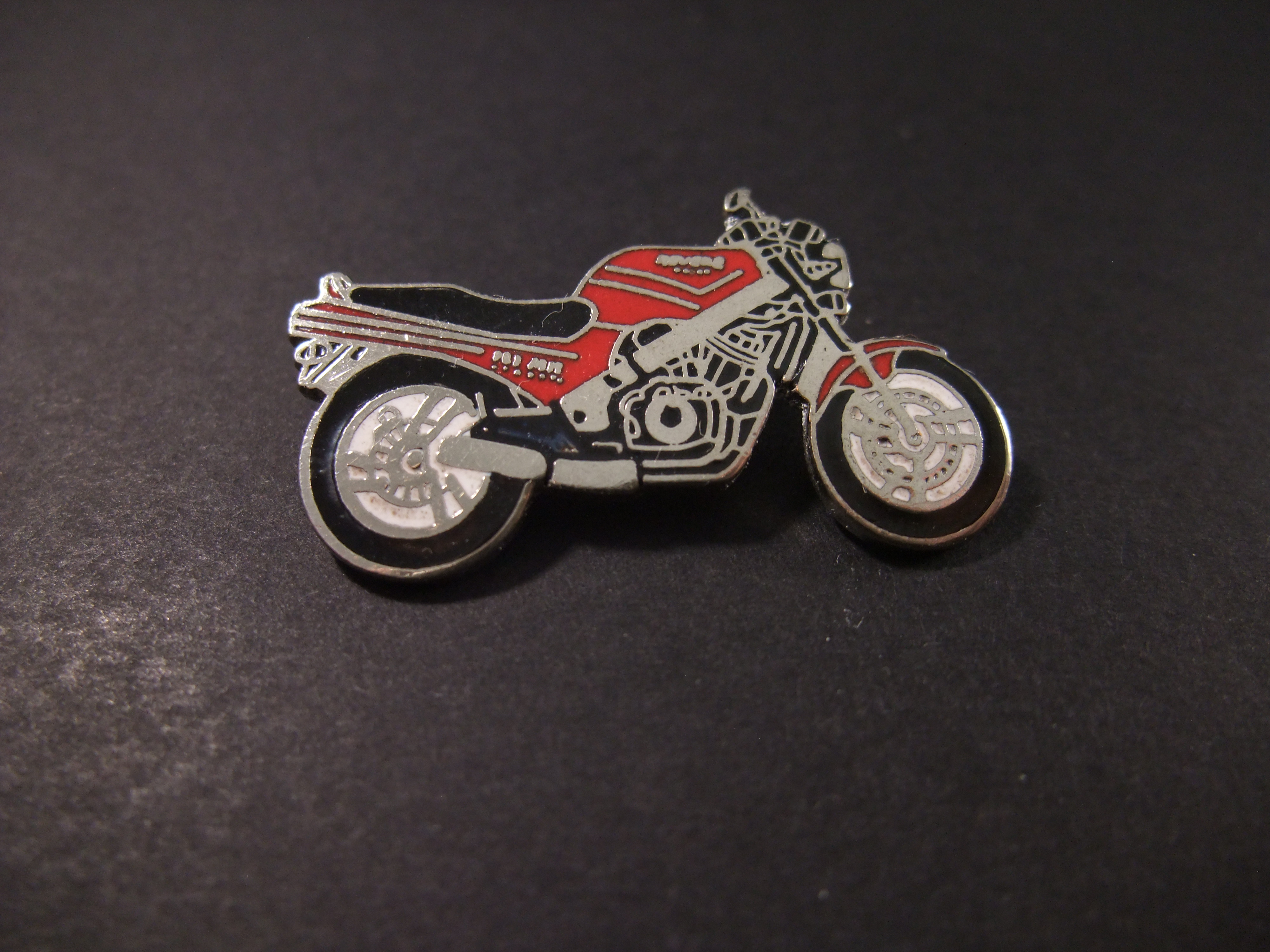 Honda NTV650 Revere (naked bike) rode motor